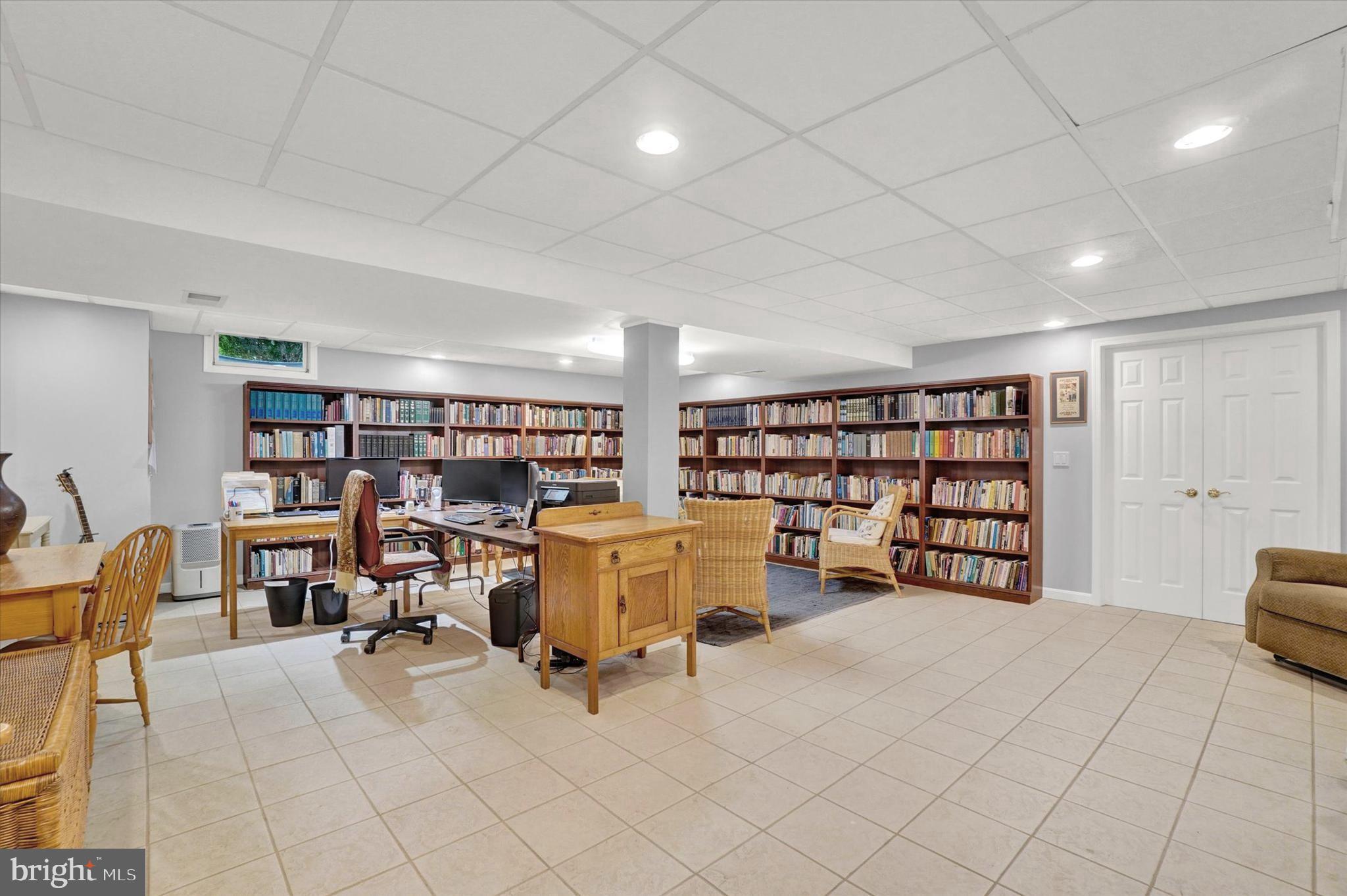 669 Woodburne Road Lewisberry, PA 17339 - Photo 22 of 44 a view of a storage & utility room with racks