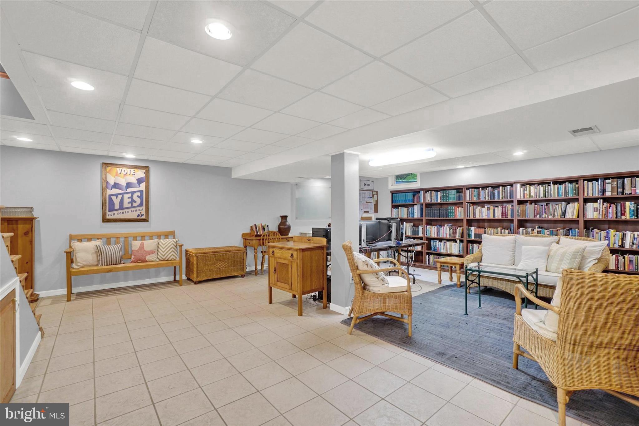 669 Woodburne Road Lewisberry, PA 17339 - Photo 23 of 44 a view of a livingroom with furniture and a book shelf