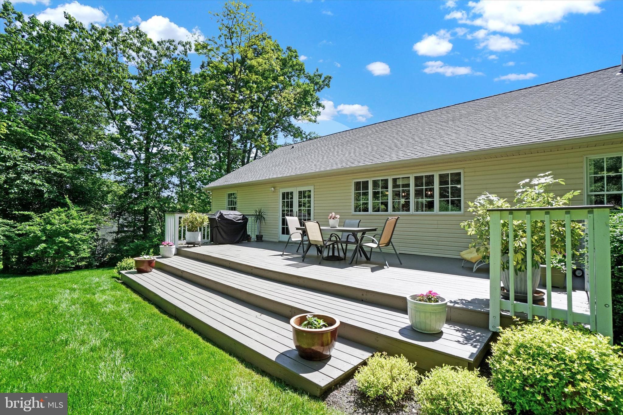 669 Woodburne Road Lewisberry, PA 17339 - Photo 25 of 44 a view of a patio with couches table and chairs and potted plants