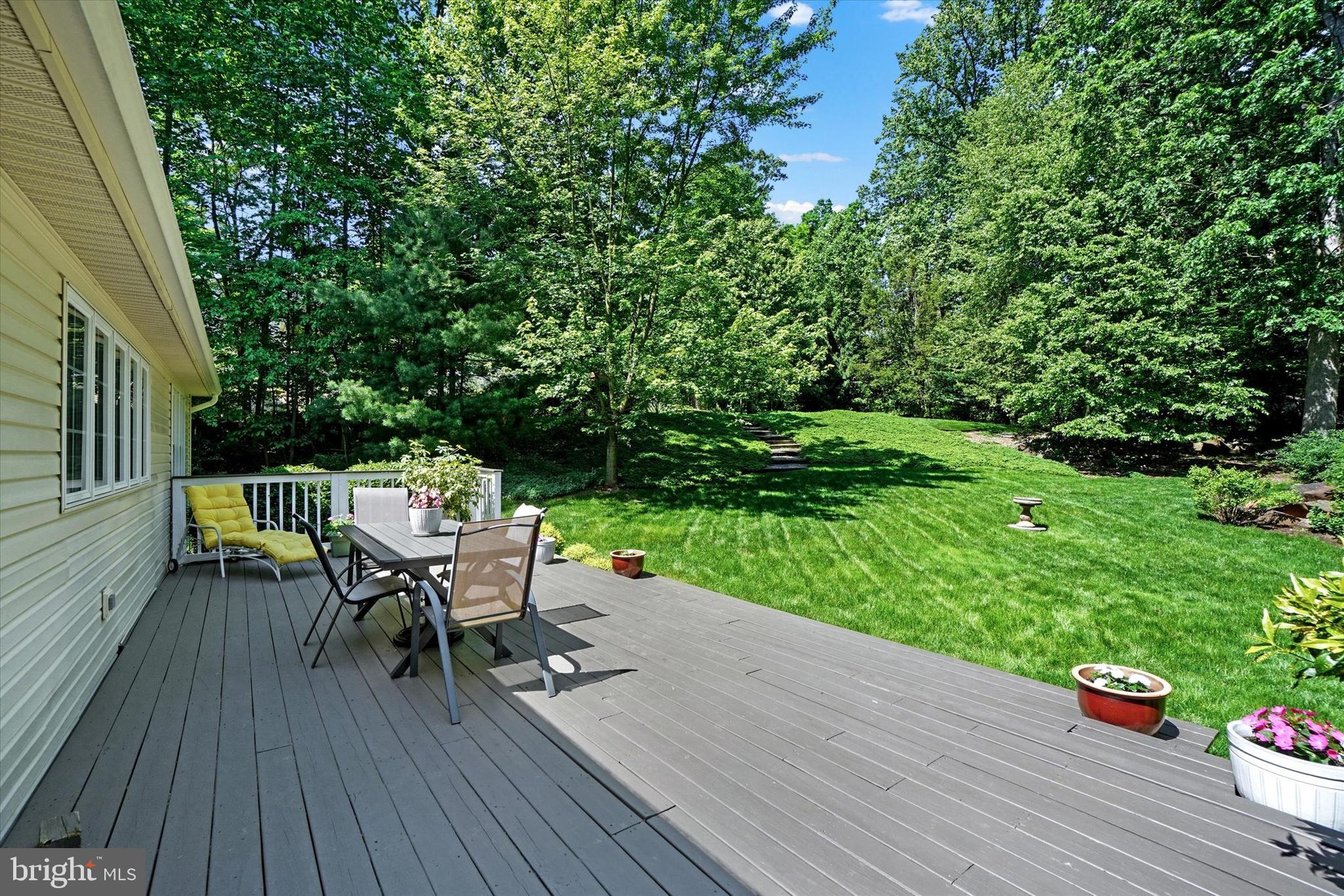 669 Woodburne Road Lewisberry, PA 17339 - Photo 26 of 44 a view of a table and chairs on the wooden deck