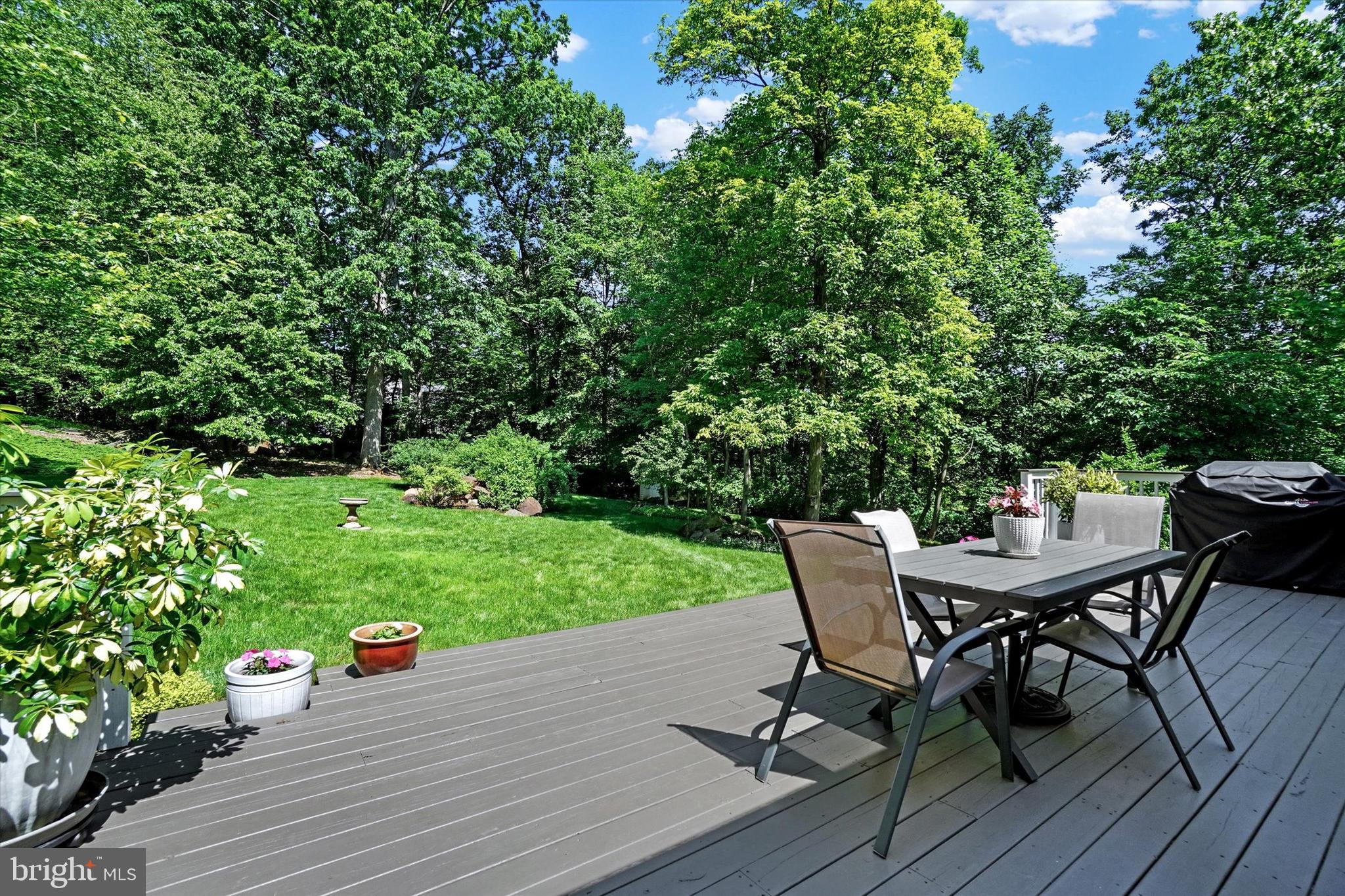 669 Woodburne Road Lewisberry, PA 17339 - Photo 27 of 44 a view of a backyard with sitting area