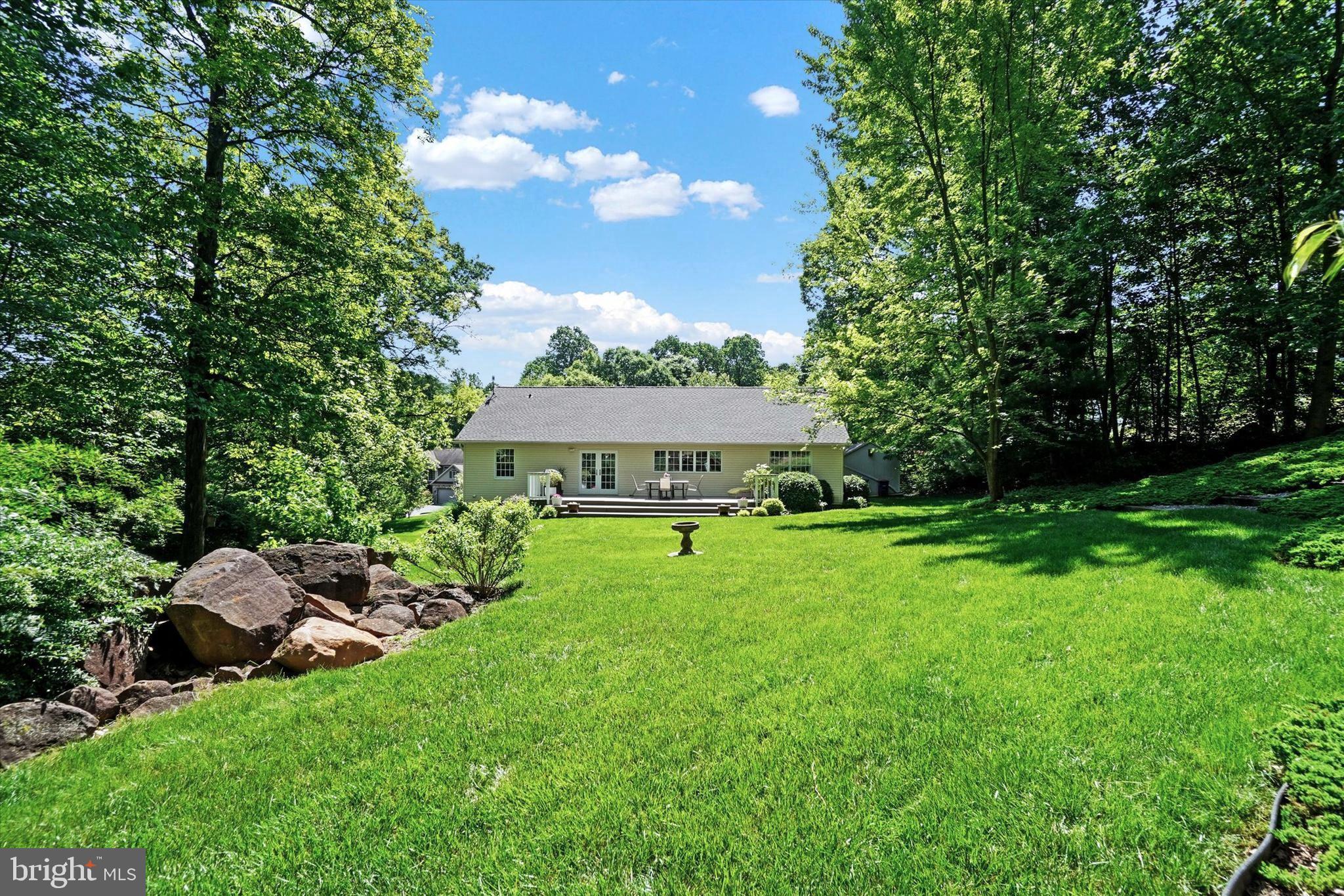 669 Woodburne Road Lewisberry, PA 17339 - Photo 29 of 44 a view of an house with backyard space and garden