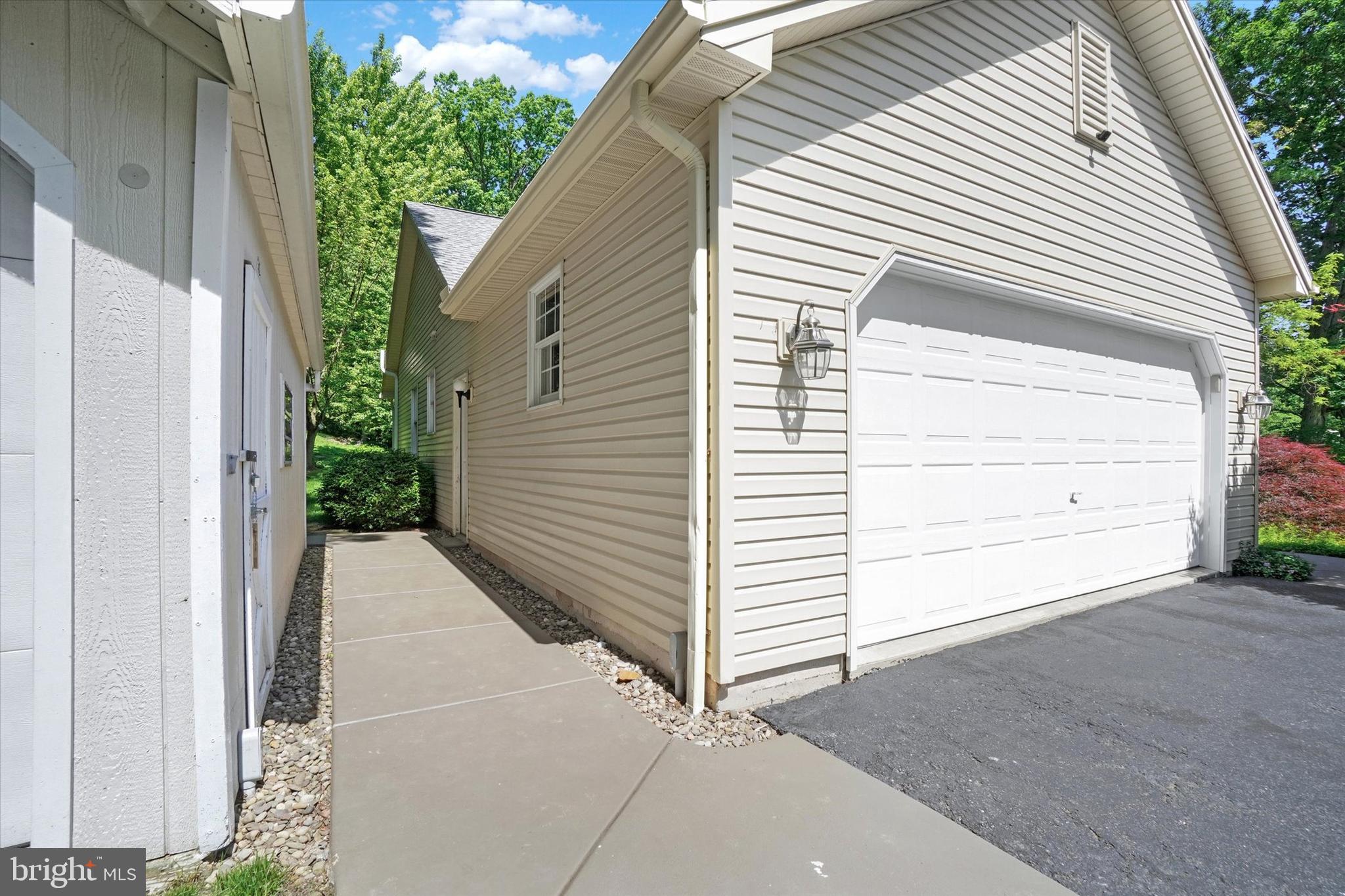 669 Woodburne Road Lewisberry, PA 17339 - Photo 34 of 44 a view of a house with a garage