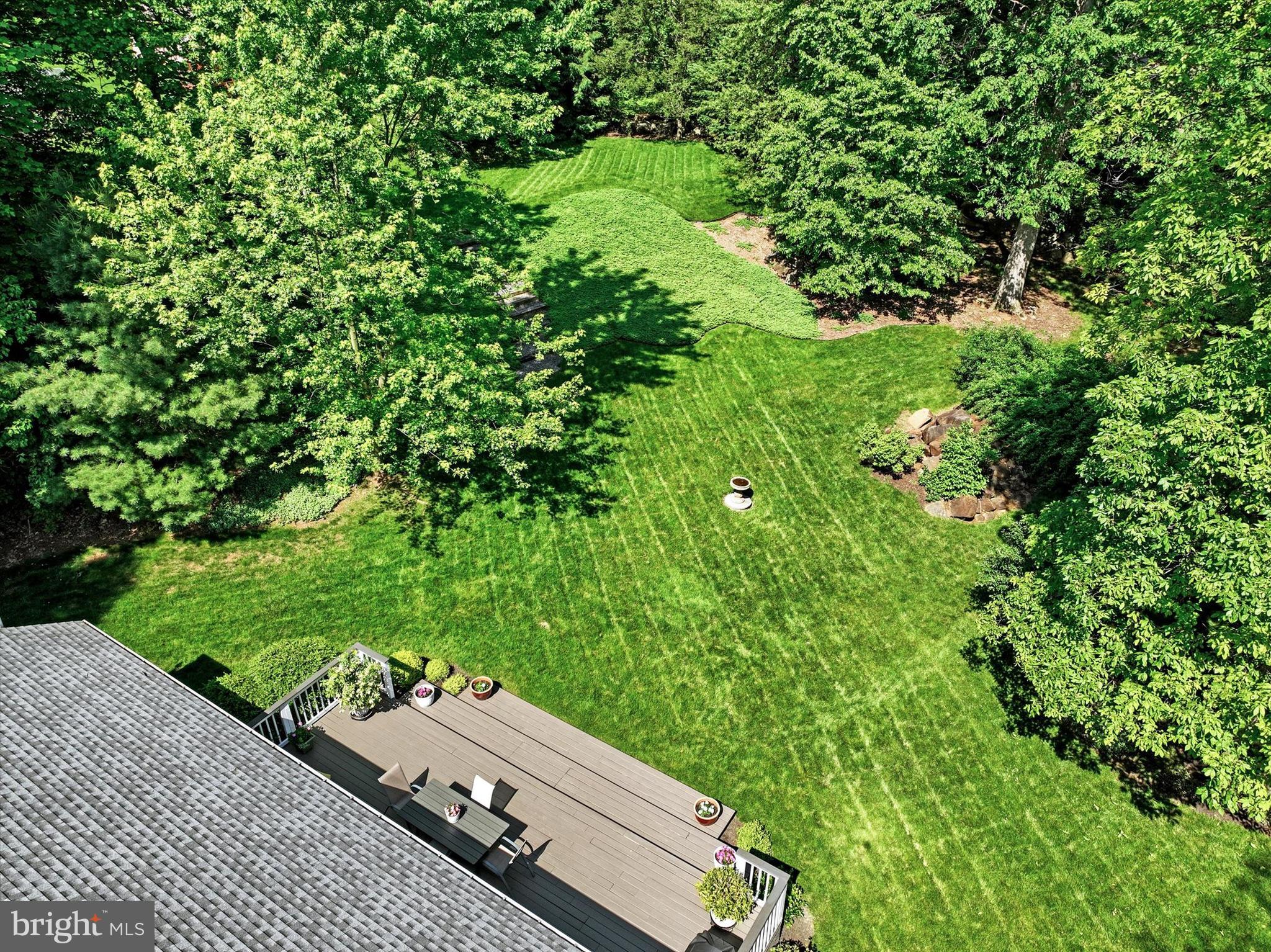669 Woodburne Road Lewisberry, PA 17339 - Photo 36 of 44 a view of a yard with potted plants