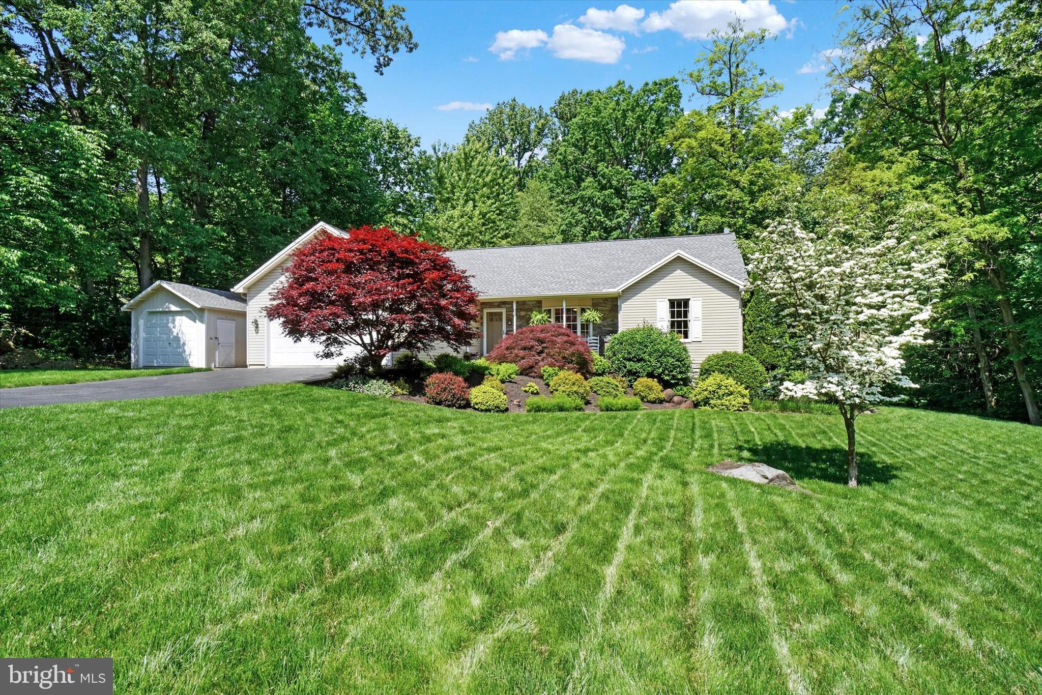 669 Woodburne Road Lewisberry, PA 17339 - Photo 37 of 44 a house view with a garden space