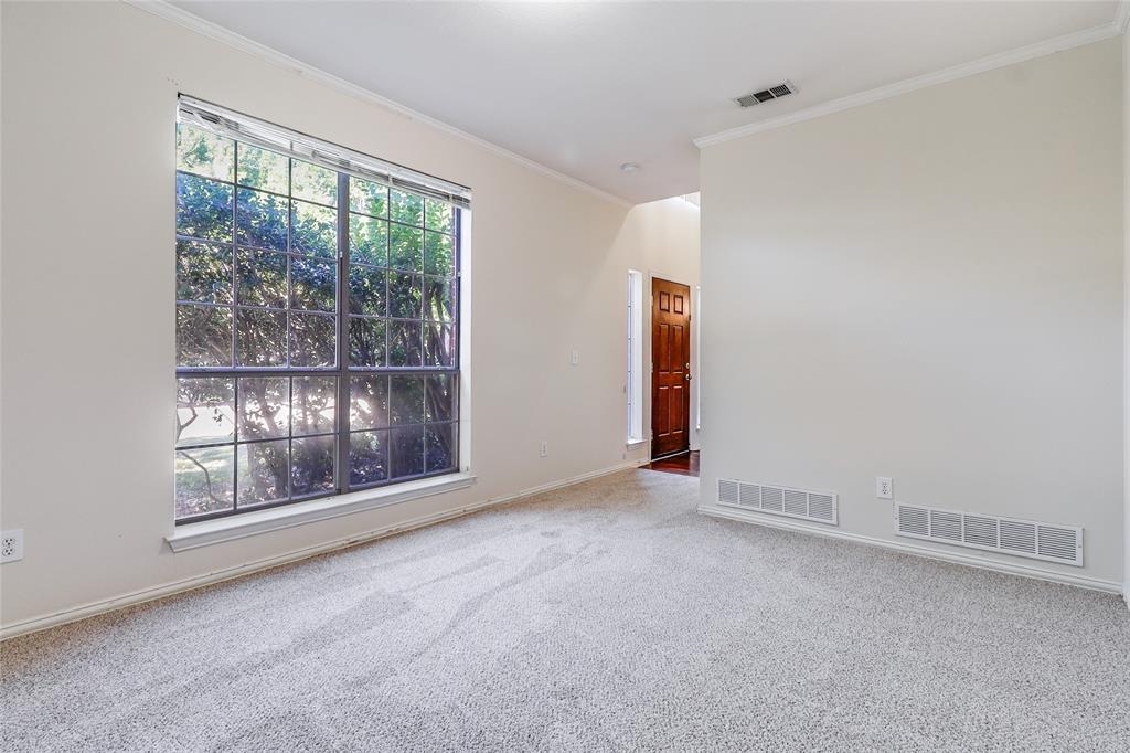 8100 Steamers Lane Frisco, TX 75035 - Photo 9 of 24 an empty room with windows