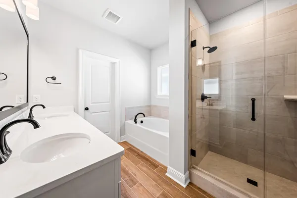 a bathroom with a sink and a shower