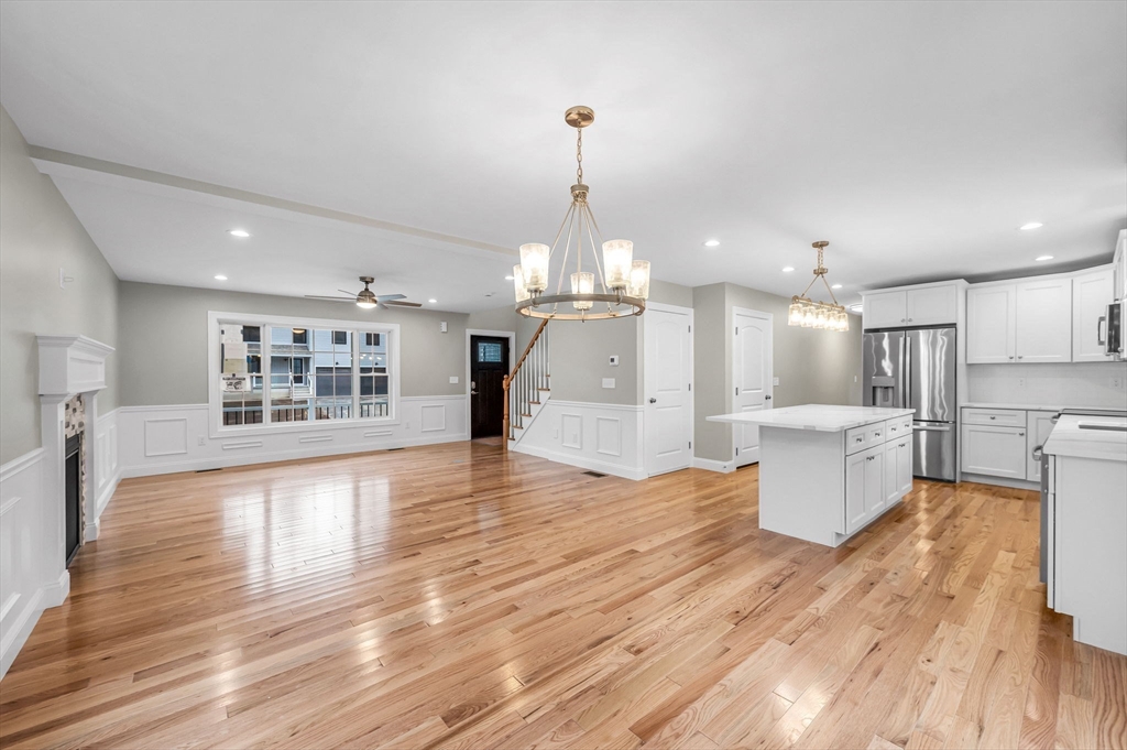 6 High Blf Road Belchertown, MA 01007 - Photo 14 of 42 a view of a kitchen with furniture and wooden floor