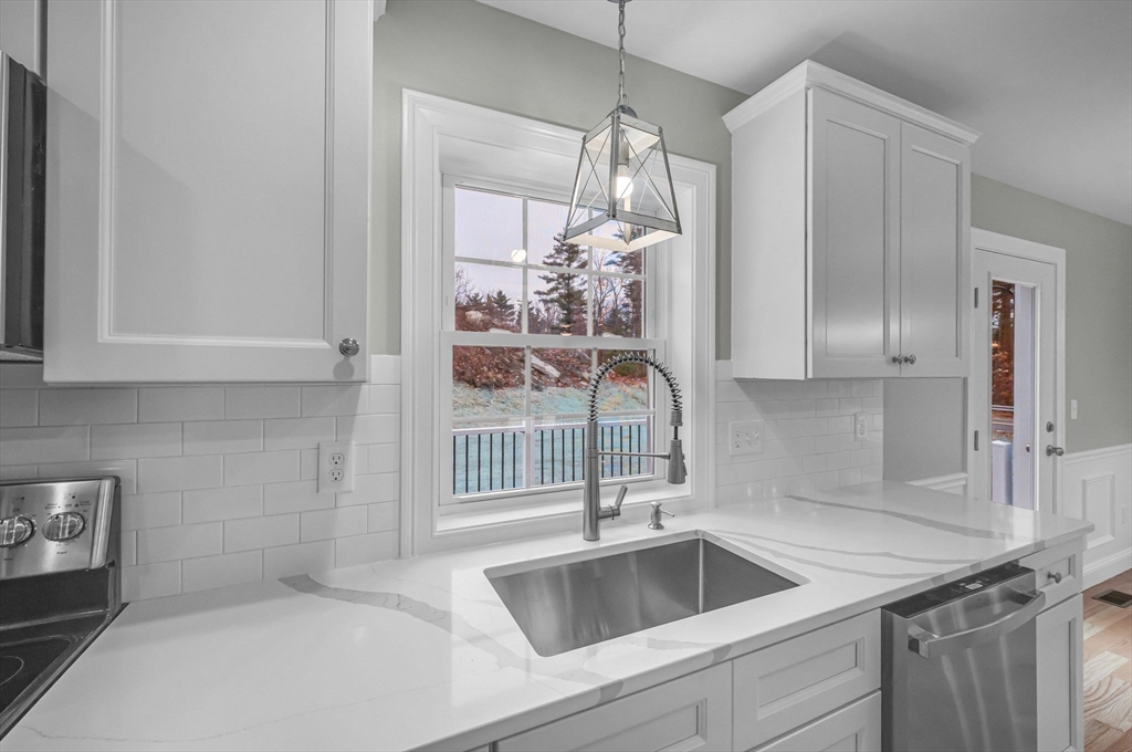 6 High Blf Road Belchertown, MA 01007 - Photo 17 of 42 a kitchen with a sink and cabinets