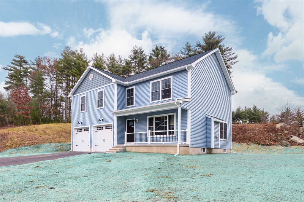 6 High Blf Road Belchertown, MA 01007 - Photo 2 of 42 a front view of a house with a yard