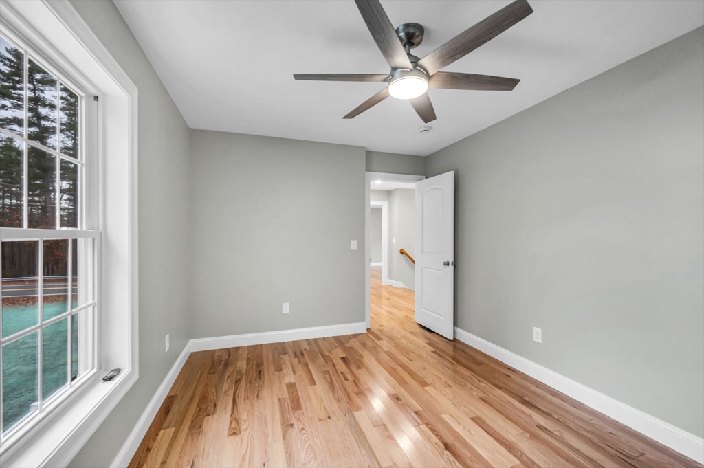 6 High Blf Road Belchertown, MA 01007 - Photo 31 of 42 wooden floor in an empty room with a window