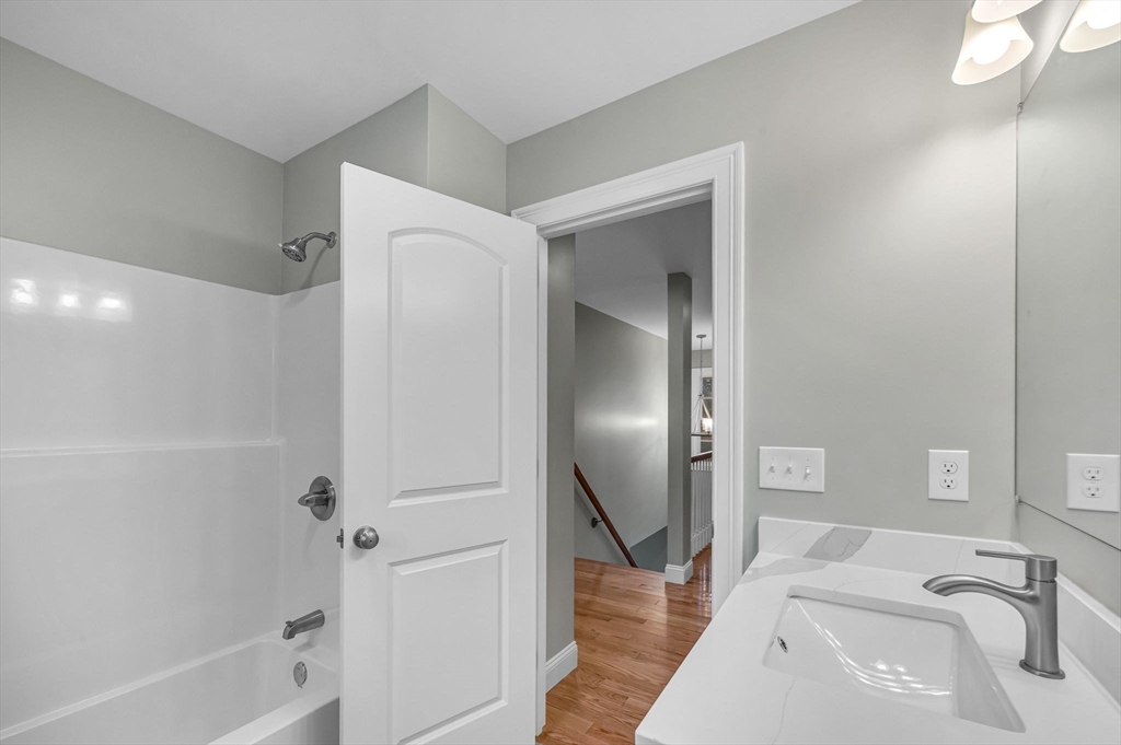 6 High Blf Road Belchertown, MA 01007 - Photo 33 of 42 a bathroom with a sink and a tub