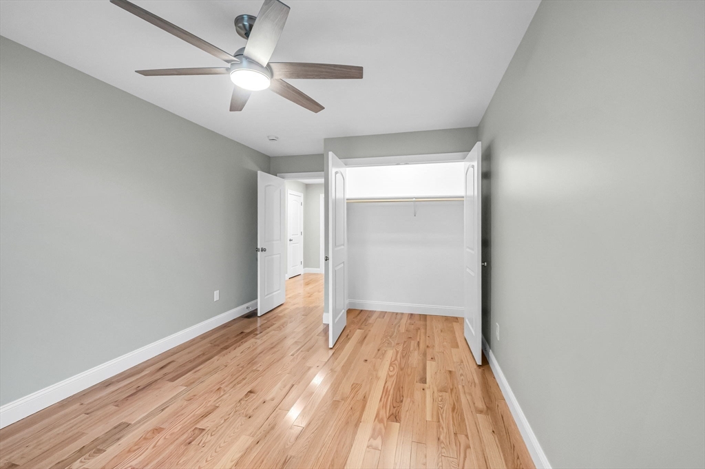 6 High Blf Road Belchertown, MA 01007 - Photo 34 of 42 wooden floor in an empty room with a window
