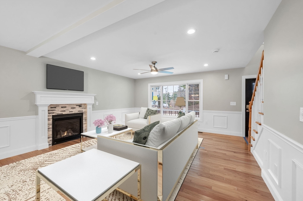 6 High Blf Road Belchertown, MA 01007 - Photo 4 of 42 a living room with furniture and a fireplace