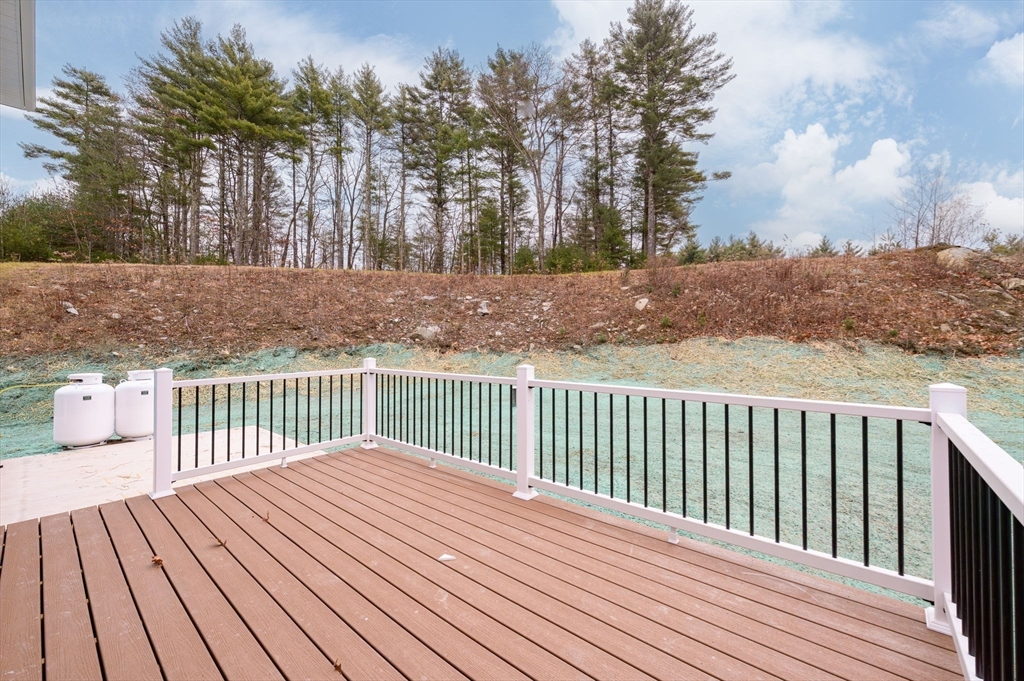 6 High Blf Road Belchertown, MA 01007 - Photo 41 of 42 a balcony with wooden floor and fence
