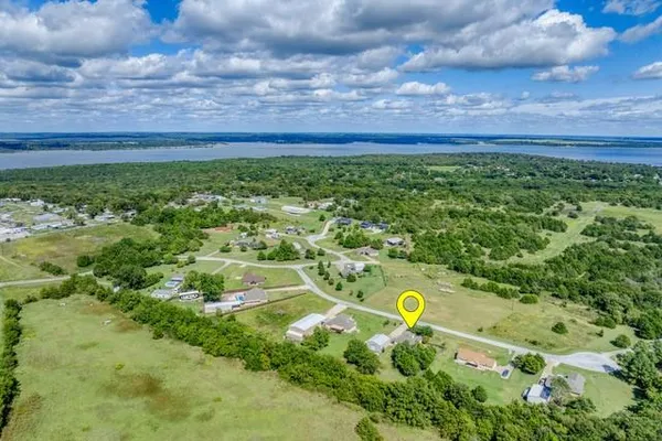 a view of yard with swimming pool