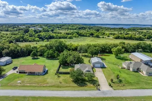 a view of a garden with an outdoor space