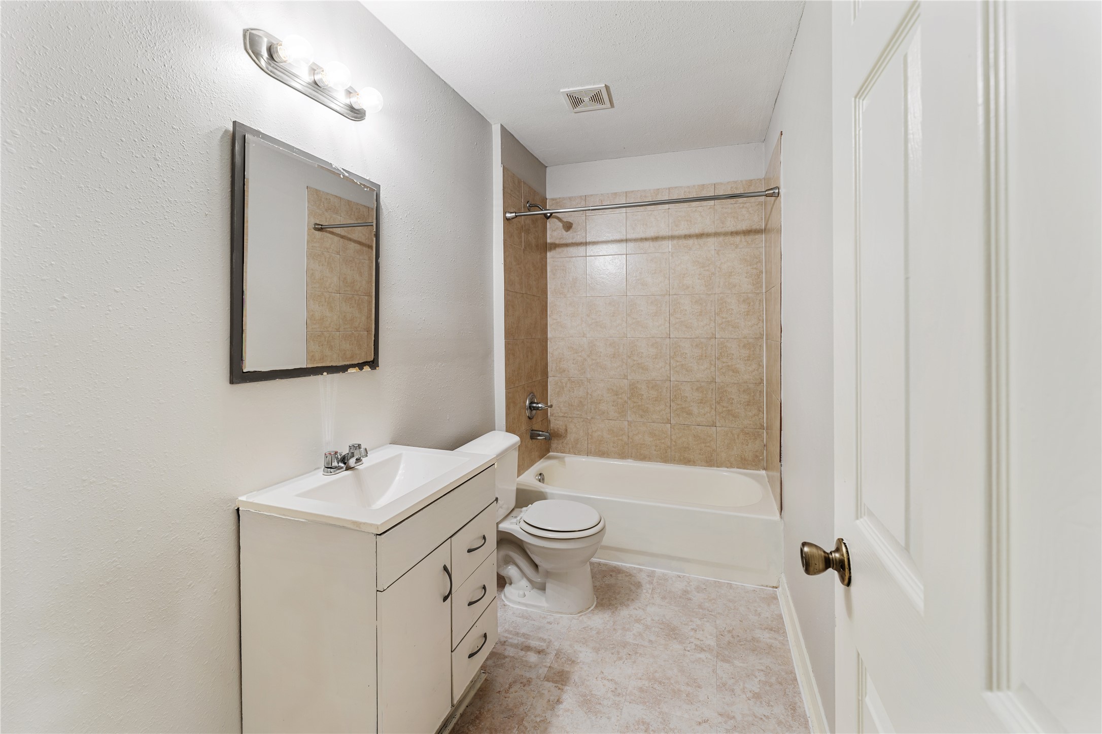 9610 Buffum Street, Unit B Houston, TX 77051 - Photo 14 of 25 a bathroom with a sink toilet tub and shower