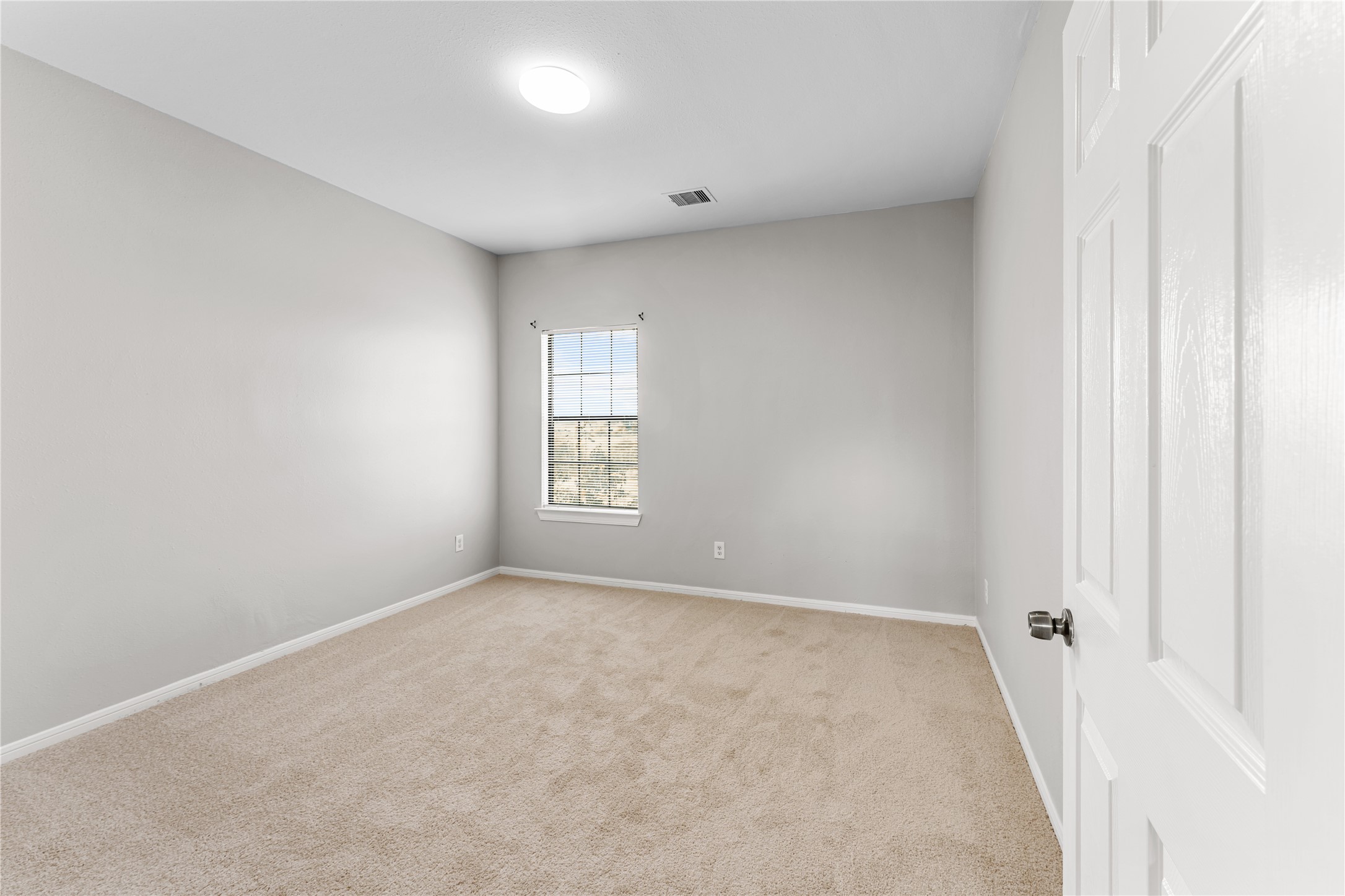 9610 Buffum Street, Unit B Houston, TX 77051 - Photo 24 of 25 an empty room with windows