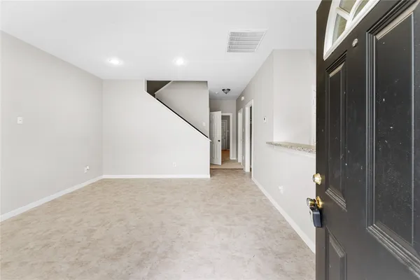 a view of hallway with stairs