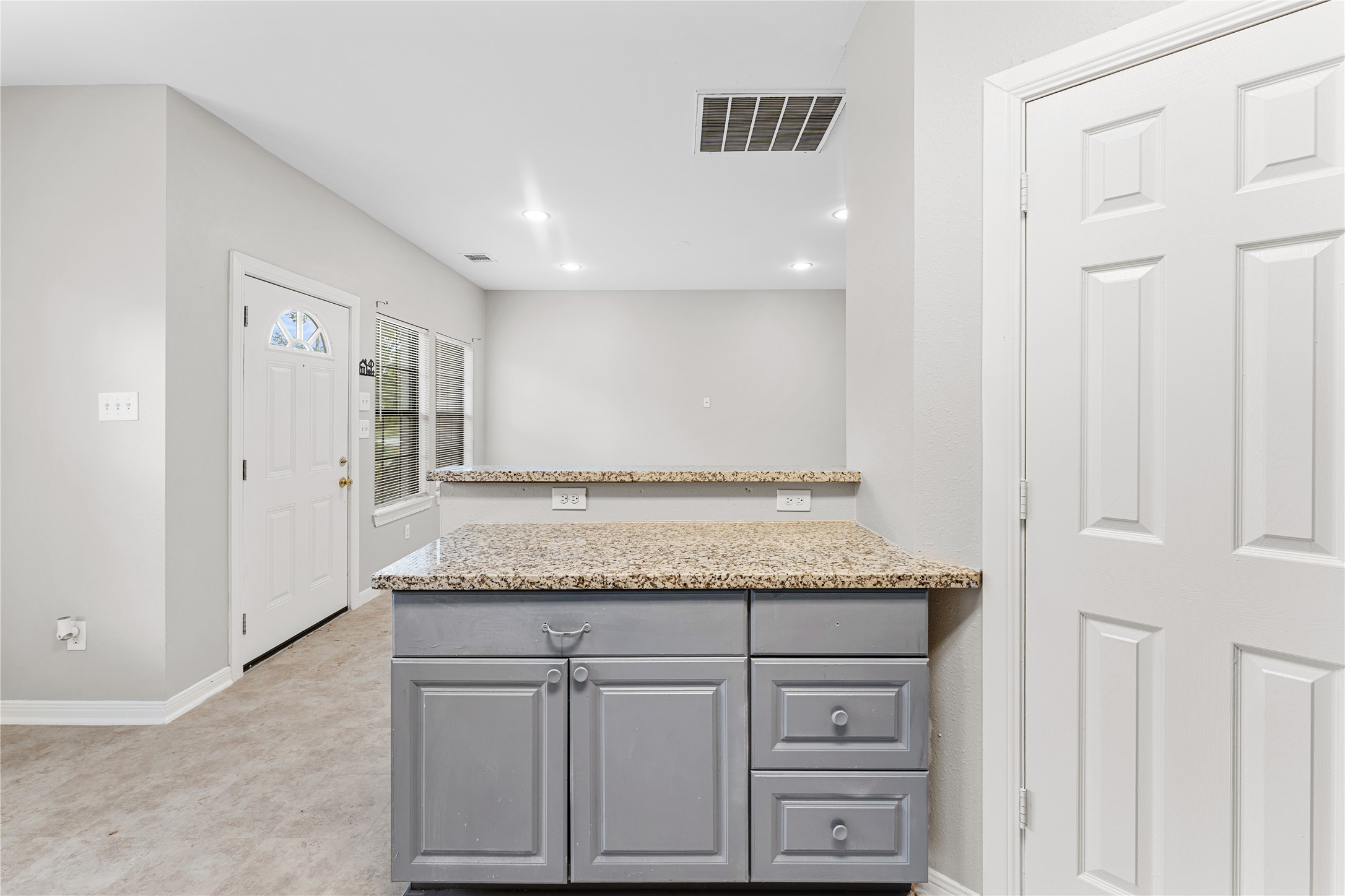 9610 Buffum Street, Unit B Houston, TX 77051 - Photo 8 of 25 a bathroom with a granite countertop sink and a mirror