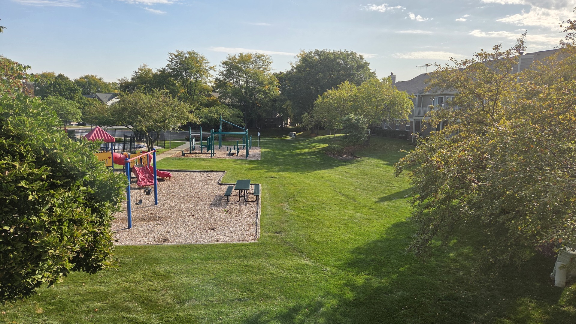 67 Beechmont Court, Unit W2 Schaumburg, IL 60193 - Photo 15 of 15 a view of a park with large trees