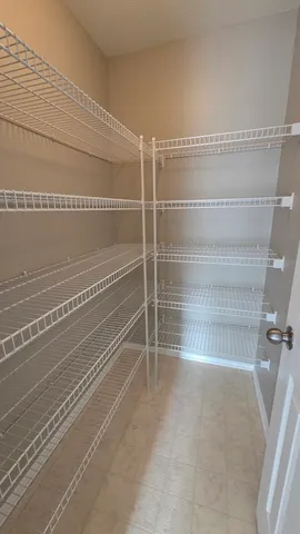 a view of a room with shelves