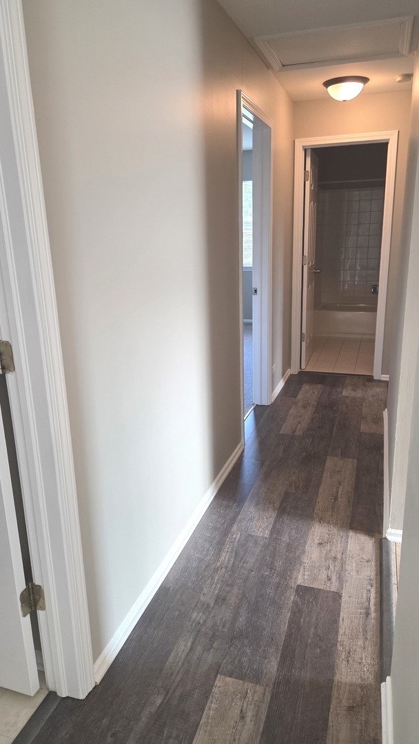 67 Beechmont Court, Unit W2 Schaumburg, IL 60193 - Photo 8 of 15 a view of entryway with a hallway
