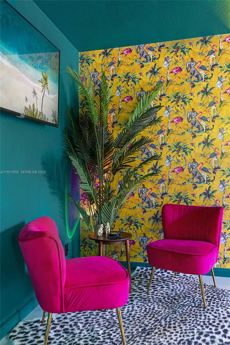 1007 Southeast 2nd Court, Unit 4 Fort Lauderdale, FL 33301 - Photo 11 of 15 a view of a red chairs in front of a building