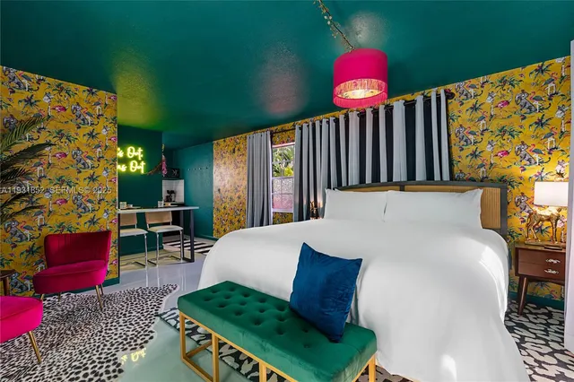 a bed room with a bed and window