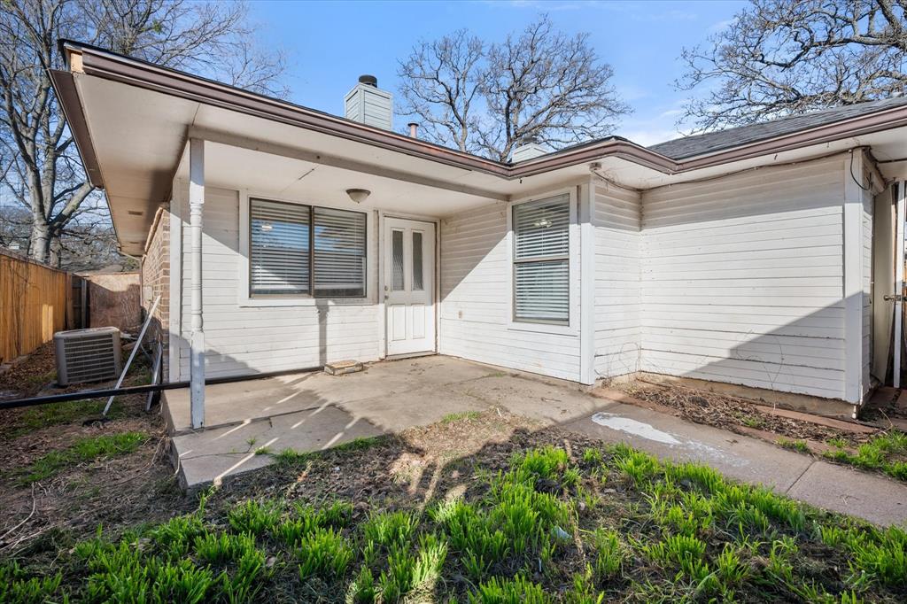 5821 Mansfield Road Arlington, TX 76017 - Photo 23 of 24 a view of a house with a backyard