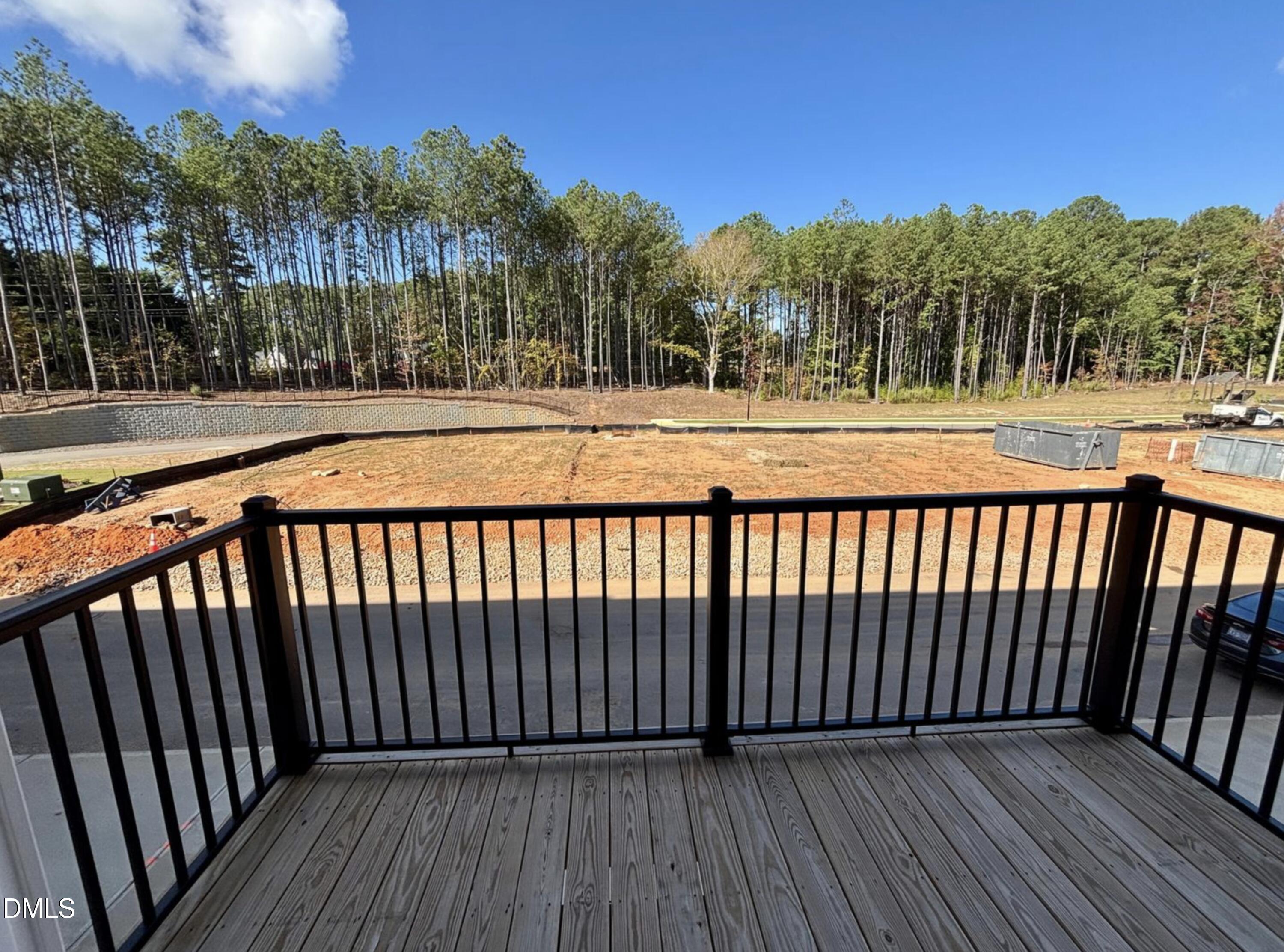 10533 Pleasant Br Drive, Unit 101 Raleigh, NC 27614 - Photo 27 of 27 a view of a balcony with wooden floor