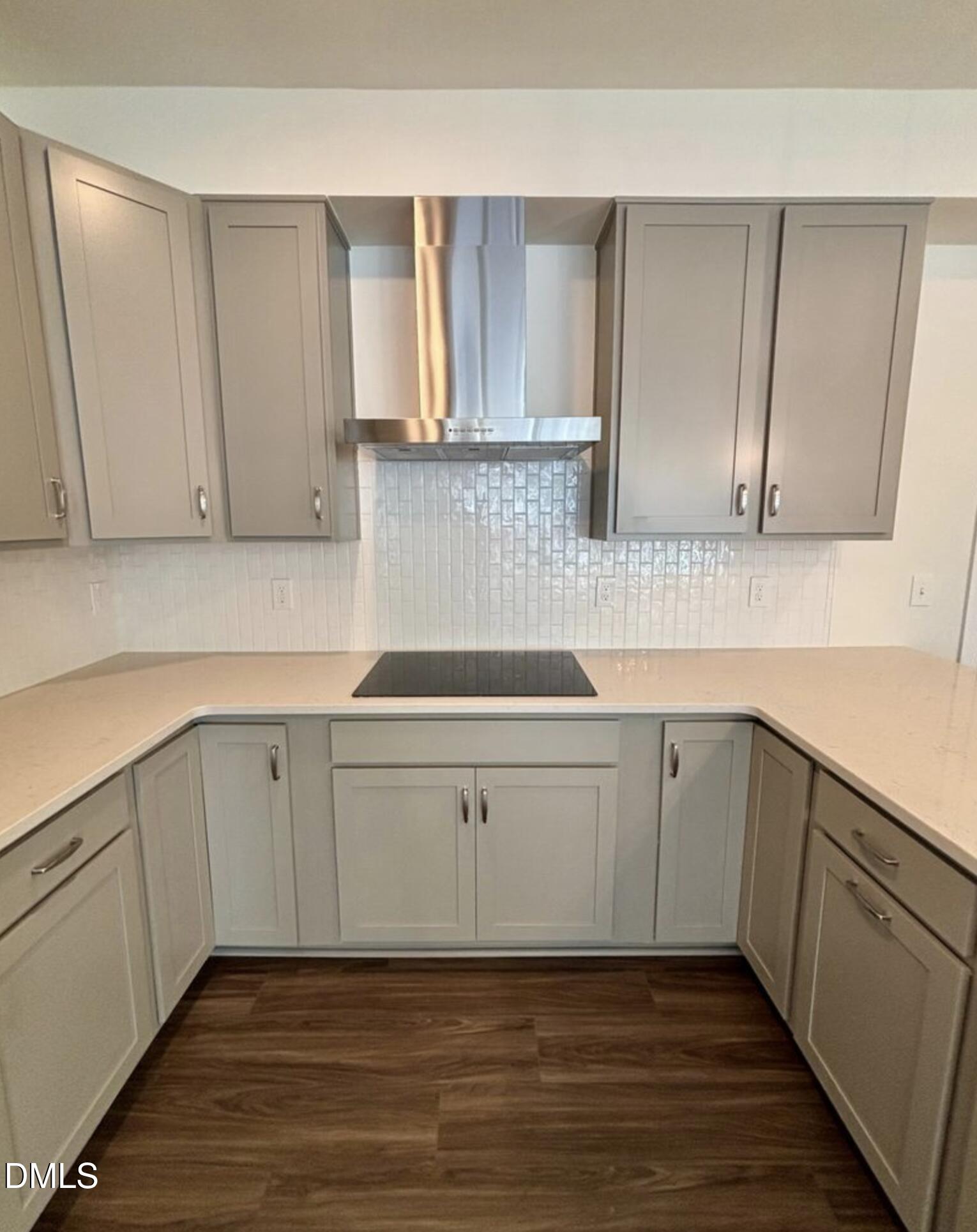 10533 Pleasant Br Drive, Unit 101 Raleigh, NC 27614 - Photo 7 of 27 a kitchen with a sink cabinets and a window