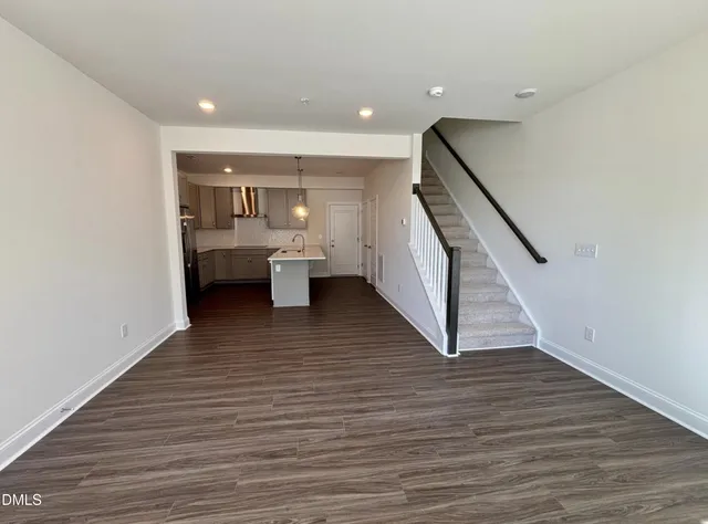 a view of livingroom with furniture and wooden floor