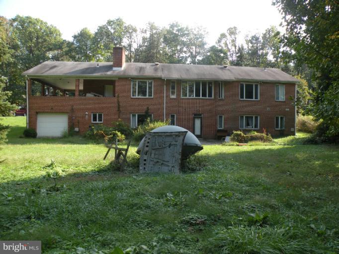 8720 Briarcroft Lane Laurel, MD 20708 - Photo 18 of 30 Rear of Home with flat grass yard
