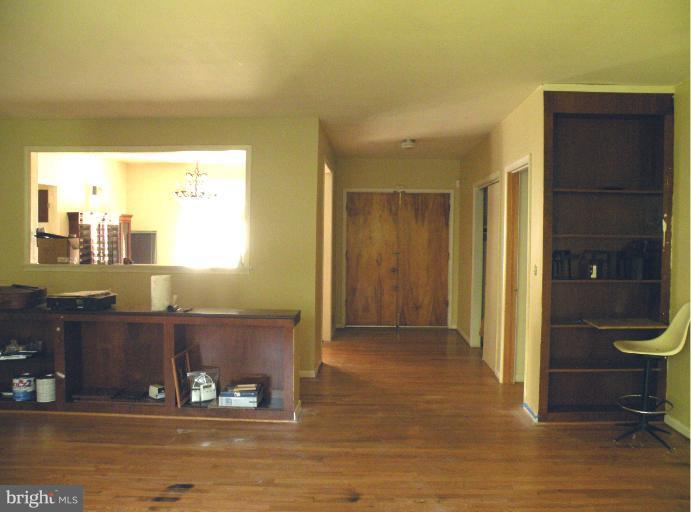 8720 Briarcroft Lane Laurel, MD 20708 - Photo 21 of 30 Foyer from Family Room & Dining room on left