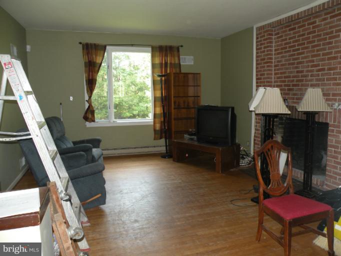 8720 Briarcroft Lane Laurel, MD 20708 - Photo 8 of 30 Living Room w/wood burning Fireplace