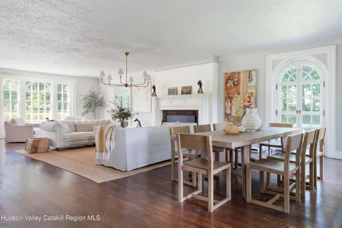 a kitchen with a sink cabinets and window
