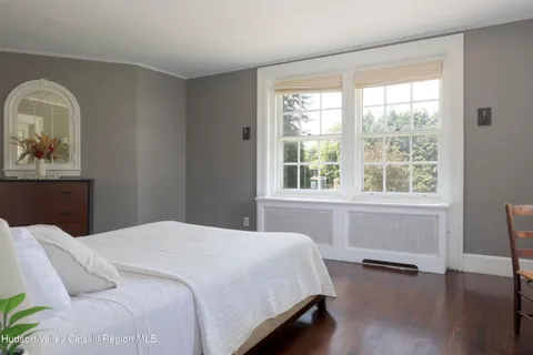 a view of a livingroom with furniture and windows