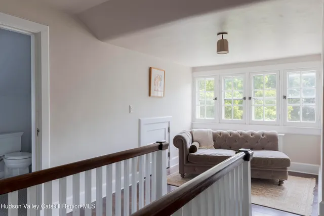 a bedroom with a bed and a table in it