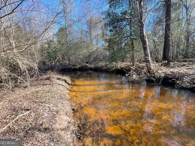 a view of lake with outdoor space