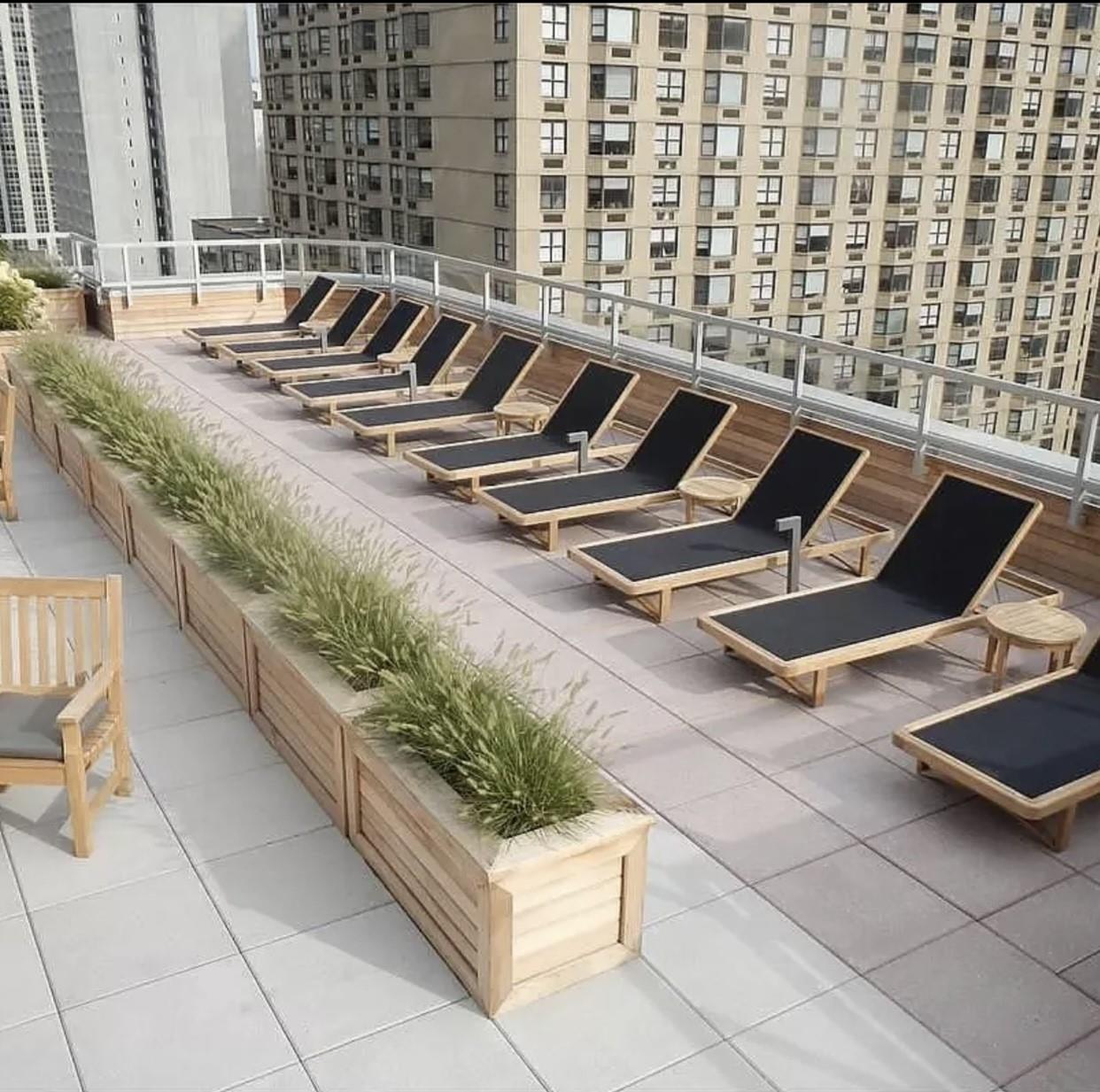 360 East 72nd Street, Unit C2205 Manhattan, NY 10021 - Photo 14 of 16 a view of swimming pool with outdoor seating