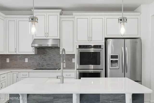 a front view of a house with yard