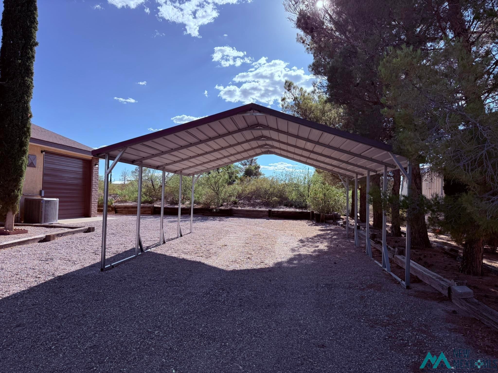 300 Rio Grande Circle Elephant Butte, NM 87935 - Photo 92 of 99 Expansive metal carport providing covered parking