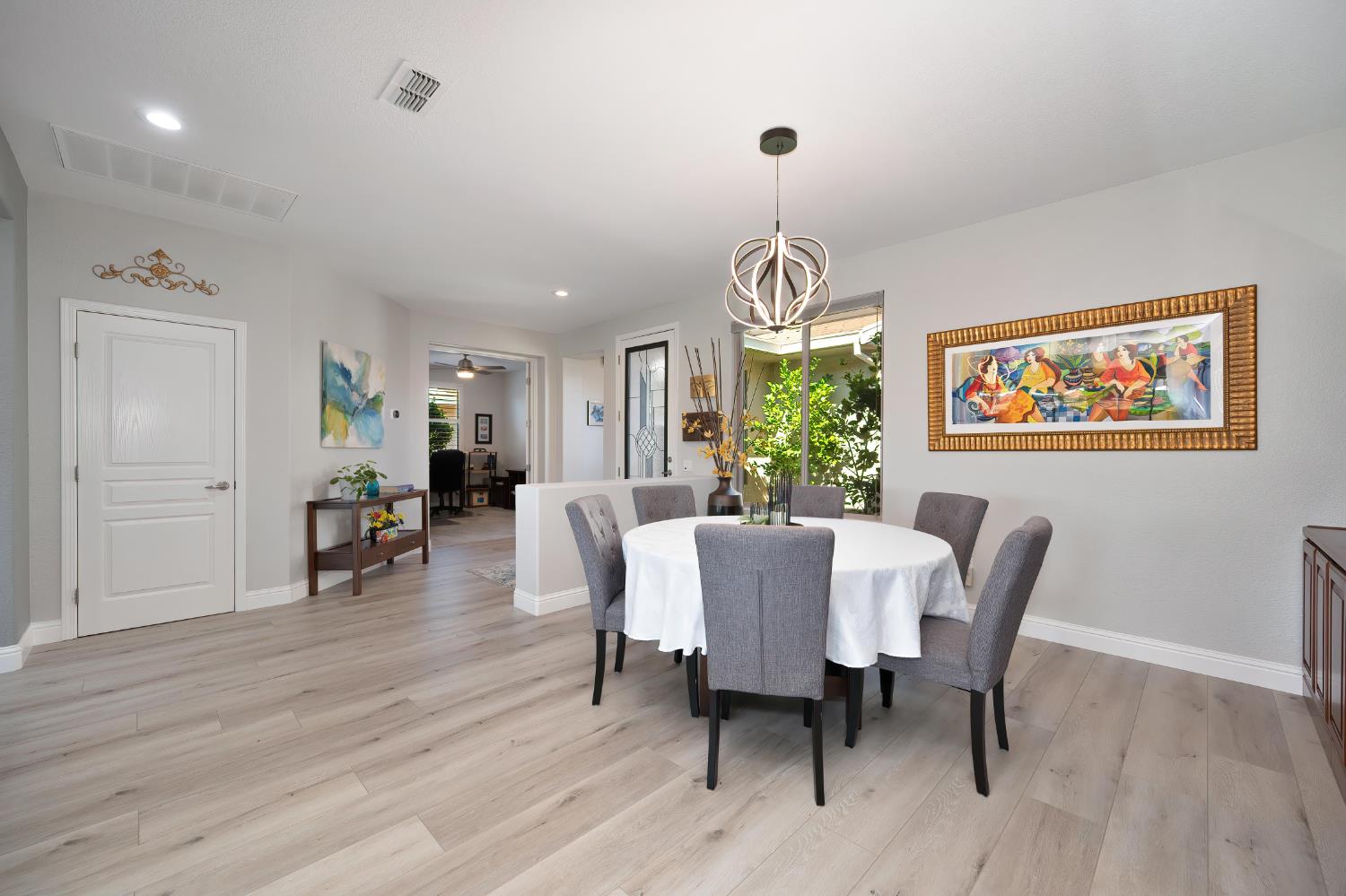 561 Rustic Ranch Lane Lincoln, CA 95648 - Photo 13 of 48 Formal dining room with peak into double door den