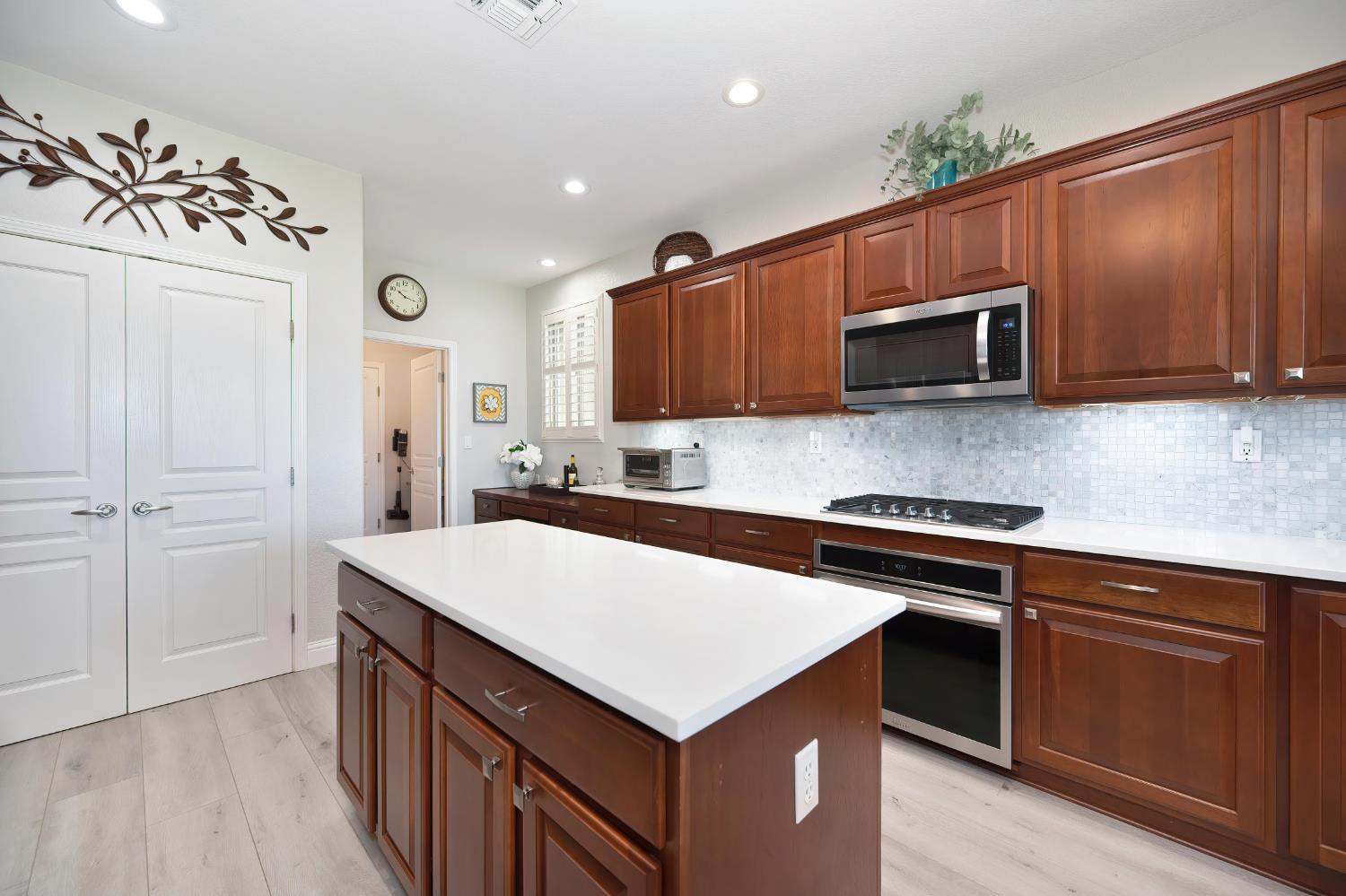 561 Rustic Ranch Lane Lincoln, CA 95648 - Photo 15 of 48 Spacious pantry, newer SS appliances