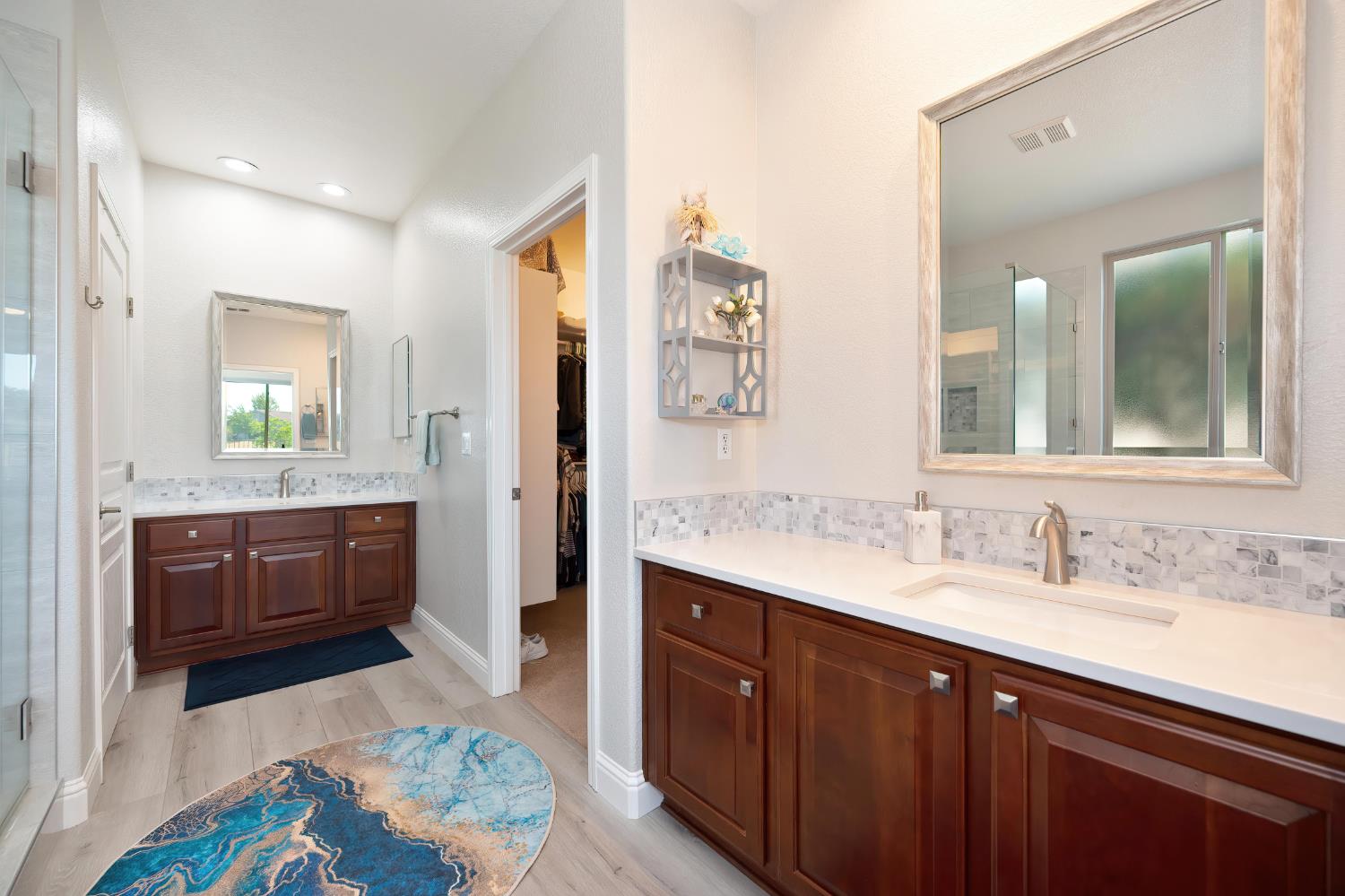 561 Rustic Ranch Lane Lincoln, CA 95648 - Photo 25 of 48 Dual sinks with quartz countertops and backsplash