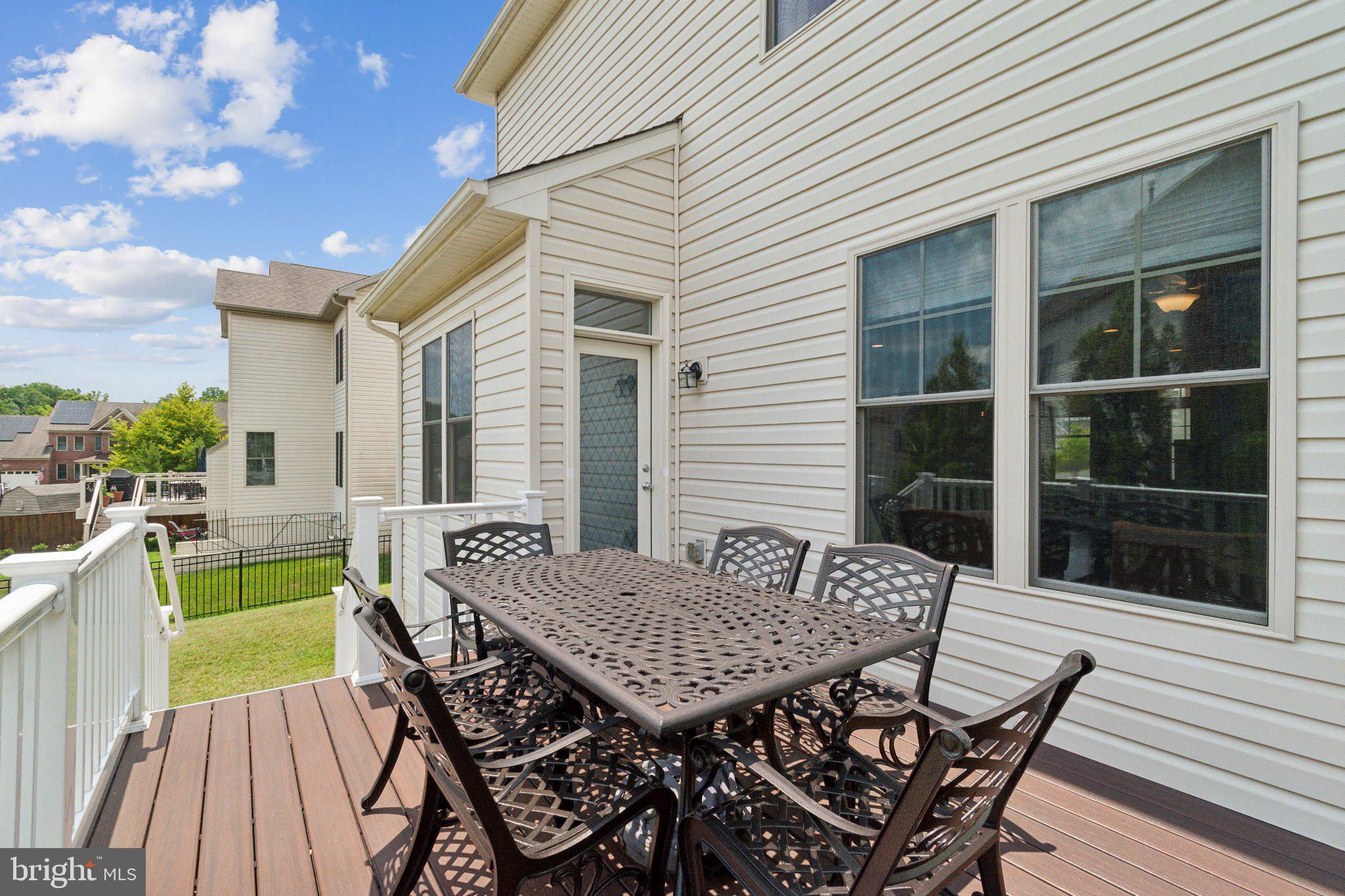 13305 Windy Meadow Lane Silver Spring, MD 20906 - Photo 24 of 25 Sunny deck perfect for gatherings.