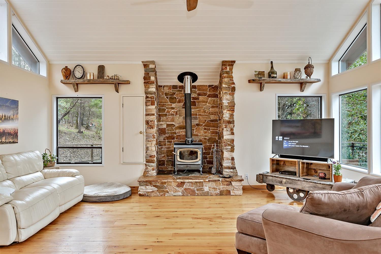 1250 Wards Creek Road Rogue River, OR 97537 - Photo 5 of 32 Gorgeous stone fireplace and wood burnin