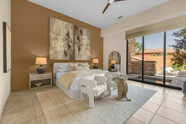 a bathroom with a double vanity sink toilet and shower